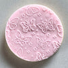 Close-up of Butterfly Magic pattern on a cookie