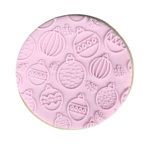 Close-up of Christmas Bauble pattern on a cookie.