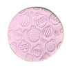 Close-up of Christmas Bauble pattern on a cookie.