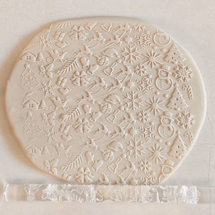 Close-up of Acrylic Embossed Rolling Pin with Festive Christmas Pattern Design | Ideal for Fondant Details