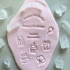 Detailed Happy Birthday fondant impressions made with versatile mini cookie stamps