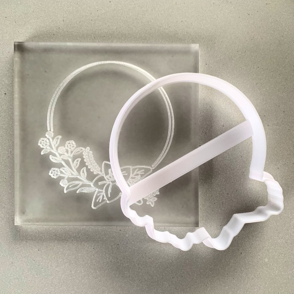 Lilly Flower Floral Frame Cookie Stamp Set featuring the embosser with the intricate Lilly flower design and the matching cookie cutter for perfectly shaped cookies