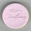 Close-up of Merry Christmas pattern on a cookie