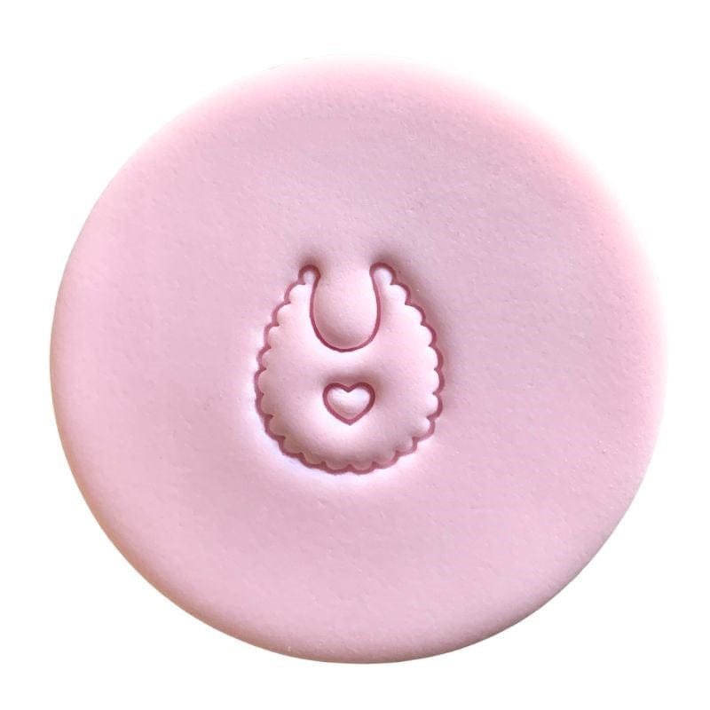 fondant cookie with baby shower bib stamp design