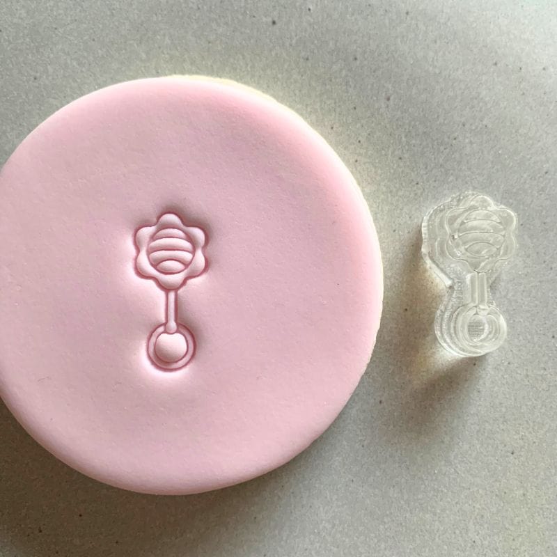 mini baby rattle cookie stamp with fondant decoration