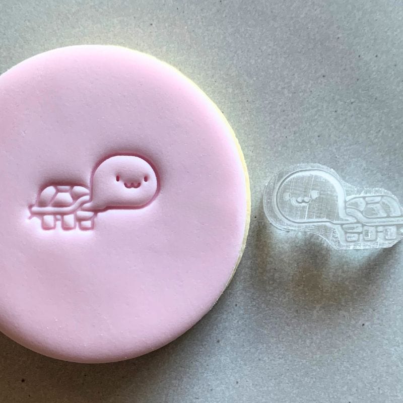 Mini Cute Turtle Cookie Stamp used to create decorated fondant cookie.