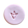 Mini Dinosaur Footprint Stamp creating fun footprint design.
