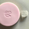 Mini Dinosaur Fossil Cookie Stamp used to create decorated fondant cookie