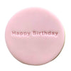Stamp with 'Happy Birthday' text on festive fondant cookie