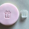 Present design stamp on festive birthday fondant cookie