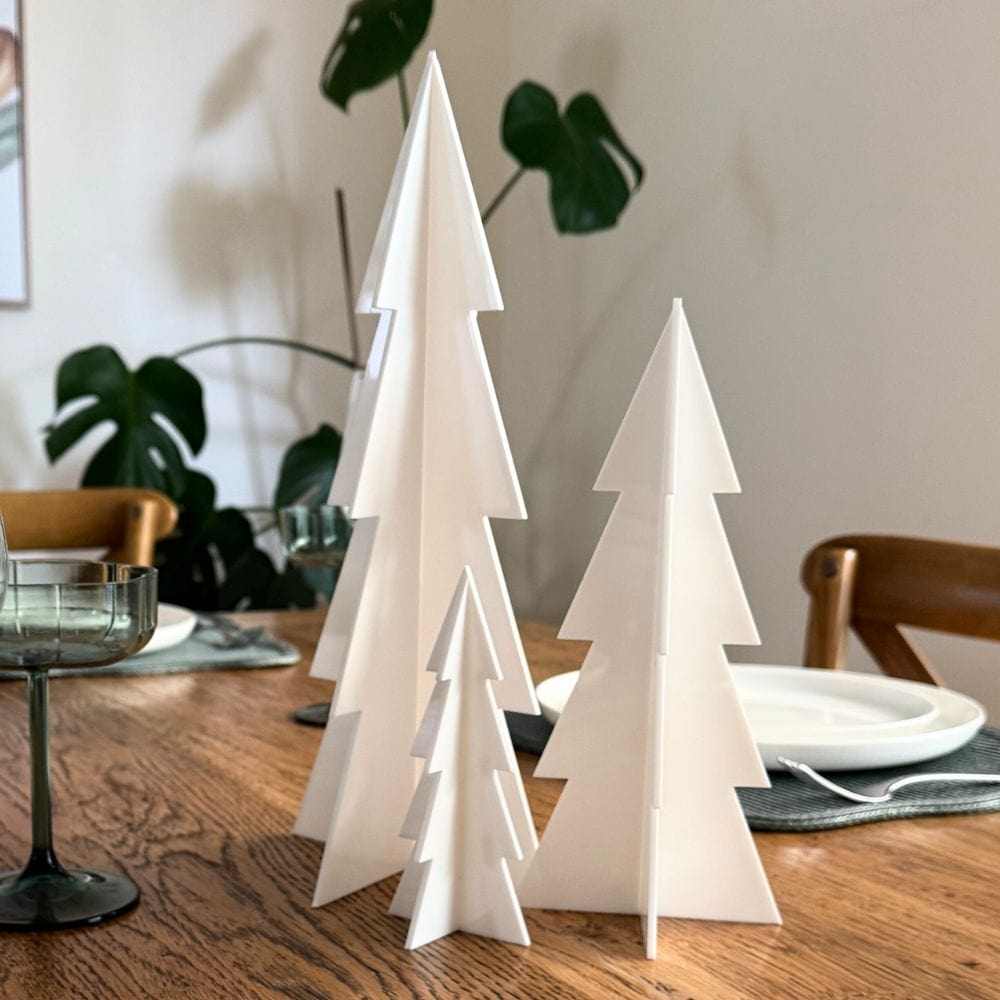 elegant acrylic christmas tree centerpiece on dining table for modern holiday styling