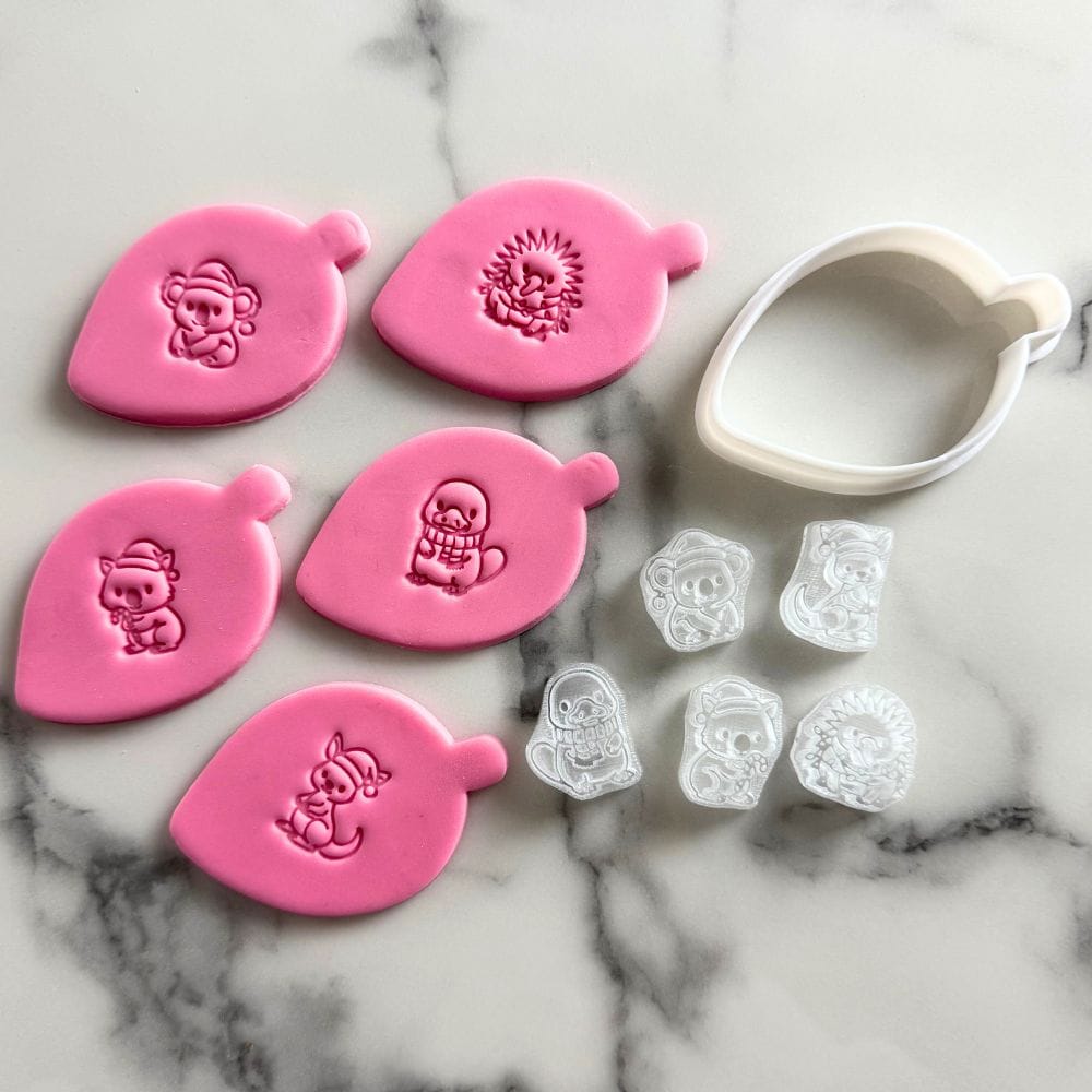 aussie christmas animals cookie stamp set with gumleaf cutter and festive koala wombat designs