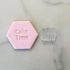 Happy Birthday cookie stamp impression on pink fondant with matching stamp.