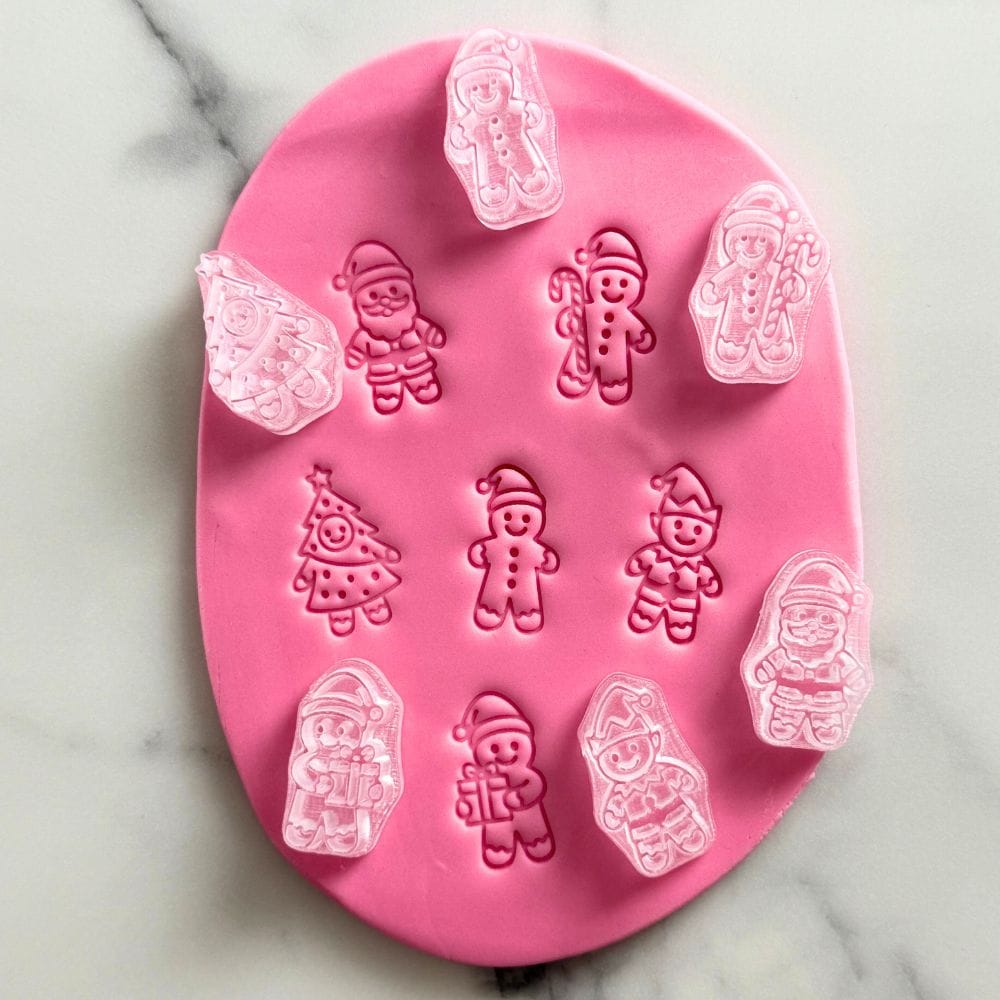 mini gingerbread christmas cookie stamp set with santa elf and gingerbread fondant designs