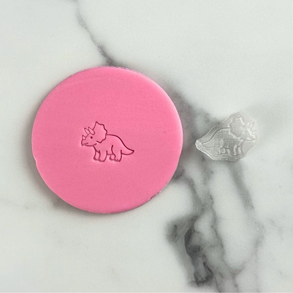 triceratops cookie stamp and matching fondant design