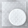 Cookie with Mini Hearts pattern created using an acrylic fondant debosser