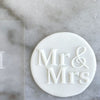 Cookie with Mr & Mrs pattern created using an acrylic fondant debosser
