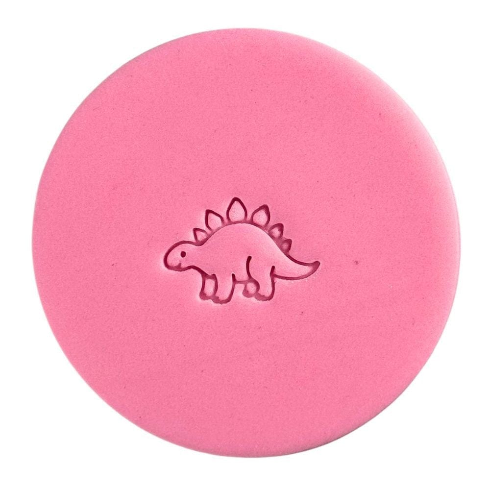 stegosaurus fondant cookie made using mini dinosaur cookie stamp