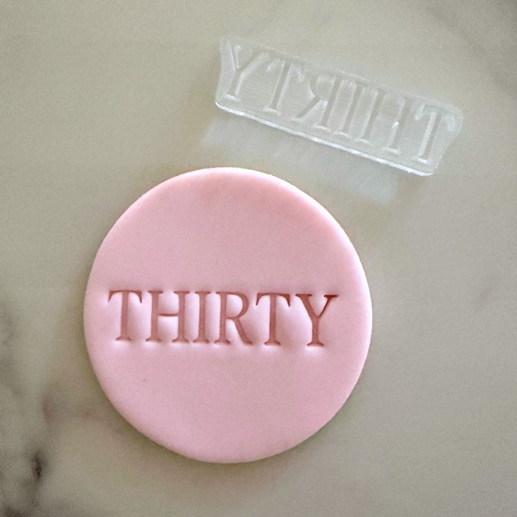 thirty cookie stamp and fondant cookie for milestone birthday bakes