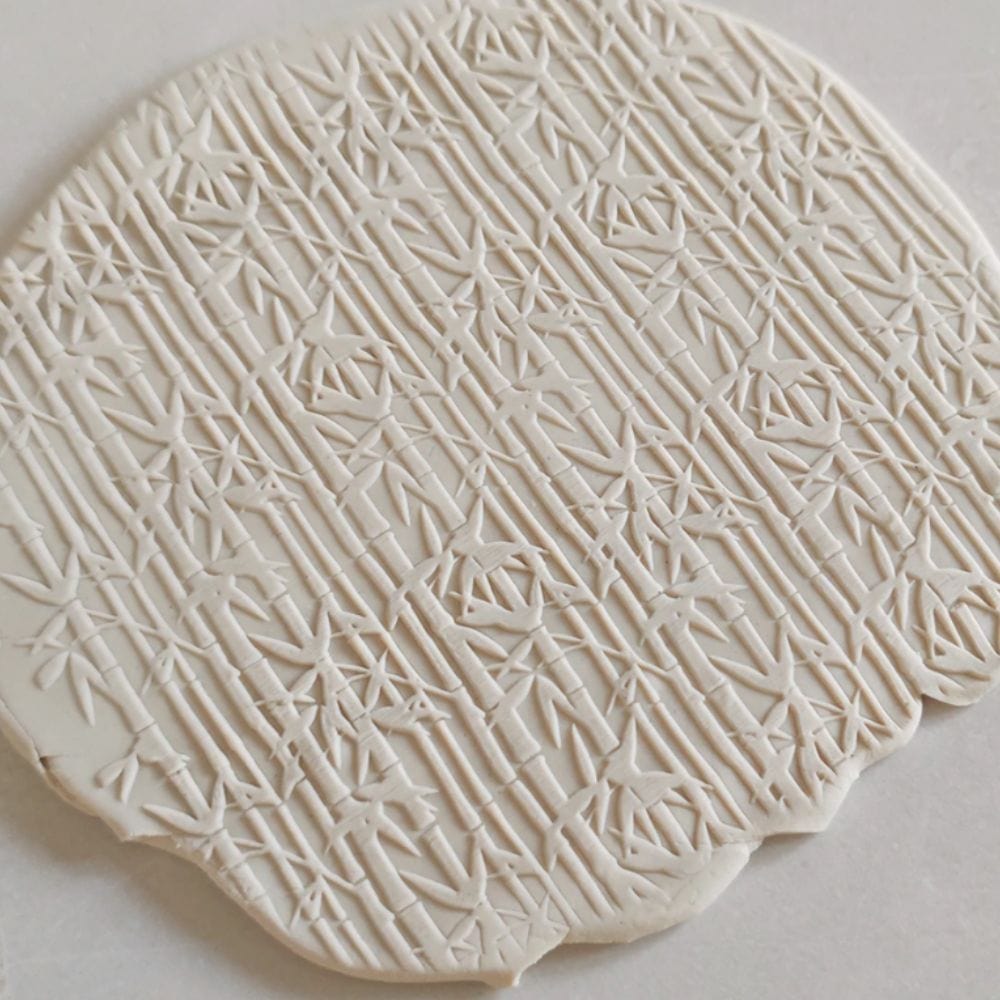 Close-up of Acrylic Embossed Rolling Pin with Bamboo Tree Design | Ideal for Fondant Details