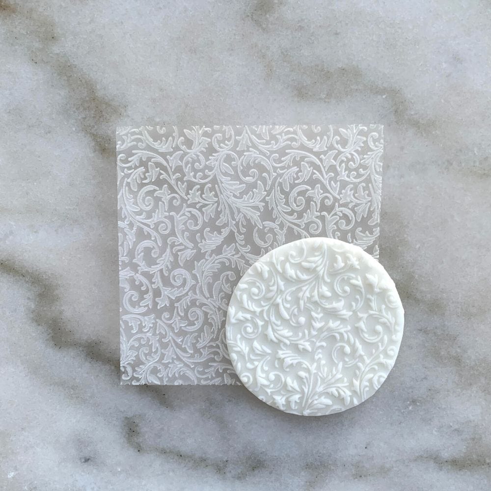 Floral Background design embossed on fondant using acrylic debosser