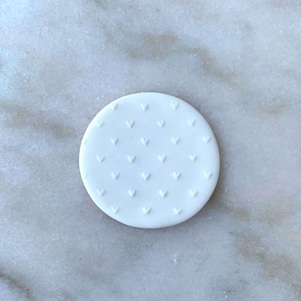 Close-up of Mini Hearts pattern on a cookie